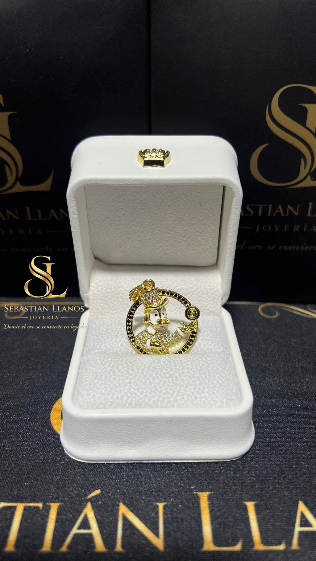 Dije tío rico moneda negro